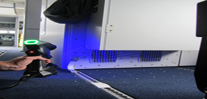 a handheld 3d scanner in action scanning a large object